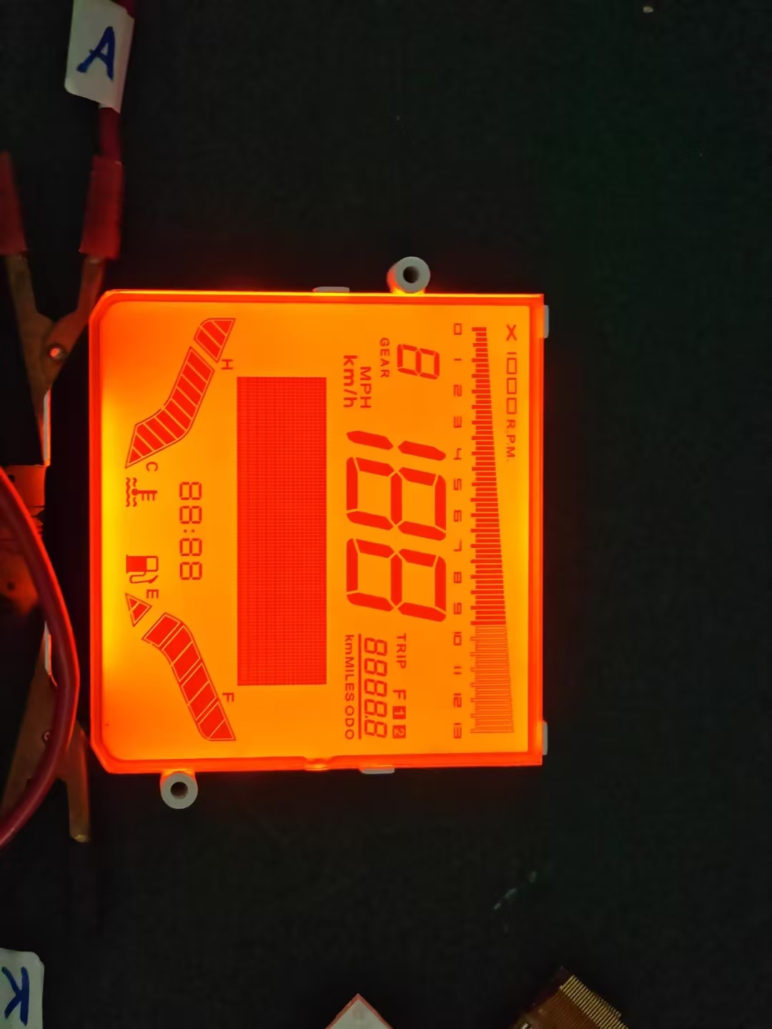 CXW0920-A0 KTM replacement LCD illuminated with orange backlight during a display check